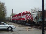 WSOR 4011 leads 4010 and 5 cars to Janesville on a rainy Saturday